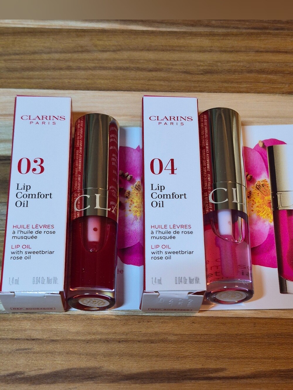 2-Piece Clarins Lip Comfort Oil: 03 Cherry & 04 Pitaya pH Reactive .04oz x2 BNIB